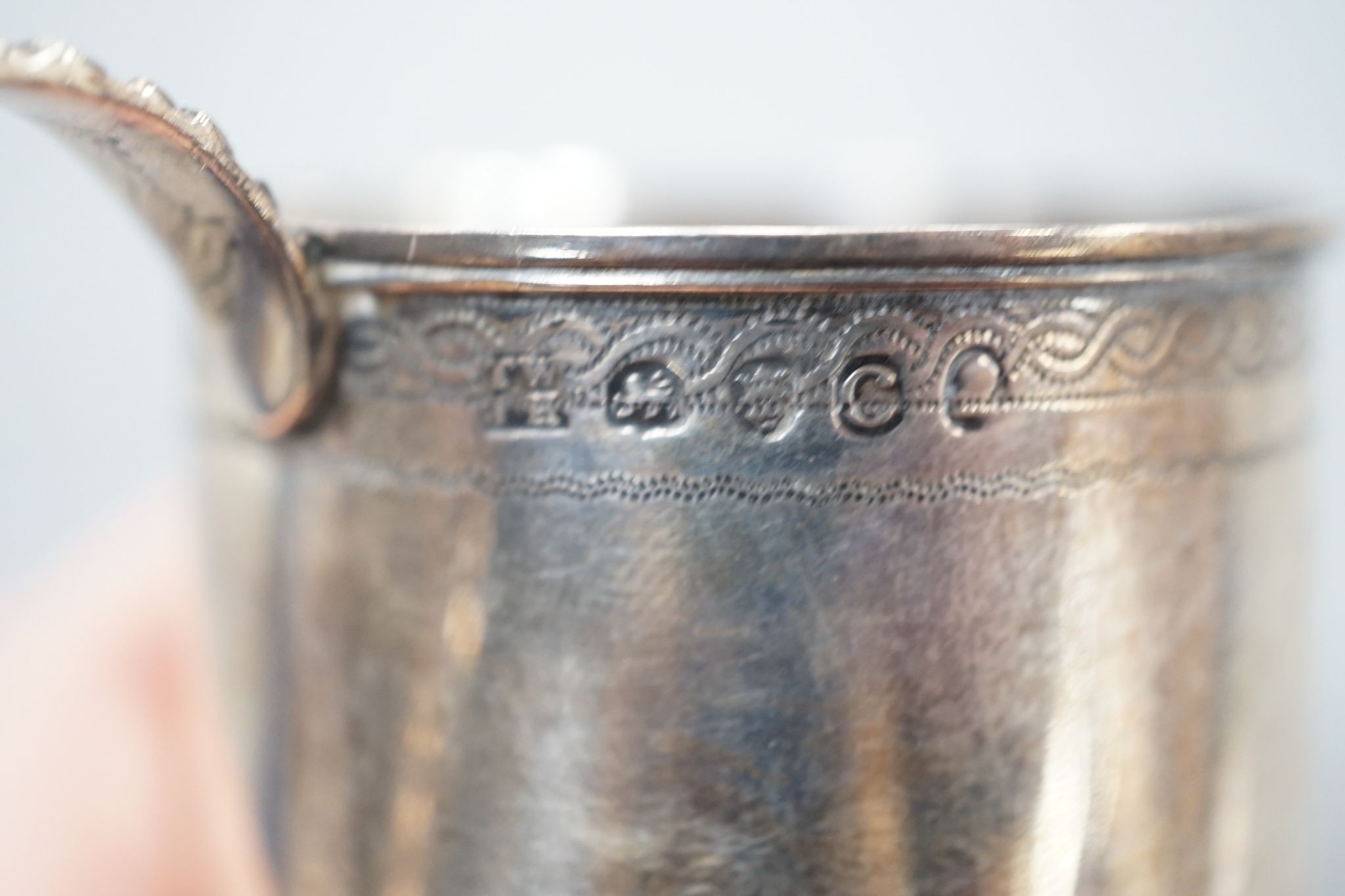 A George III silver small mug, Thomas Wallis & Jonthan Hayne, London, 1818, with engraved monogram, 57mm, 60 grams.